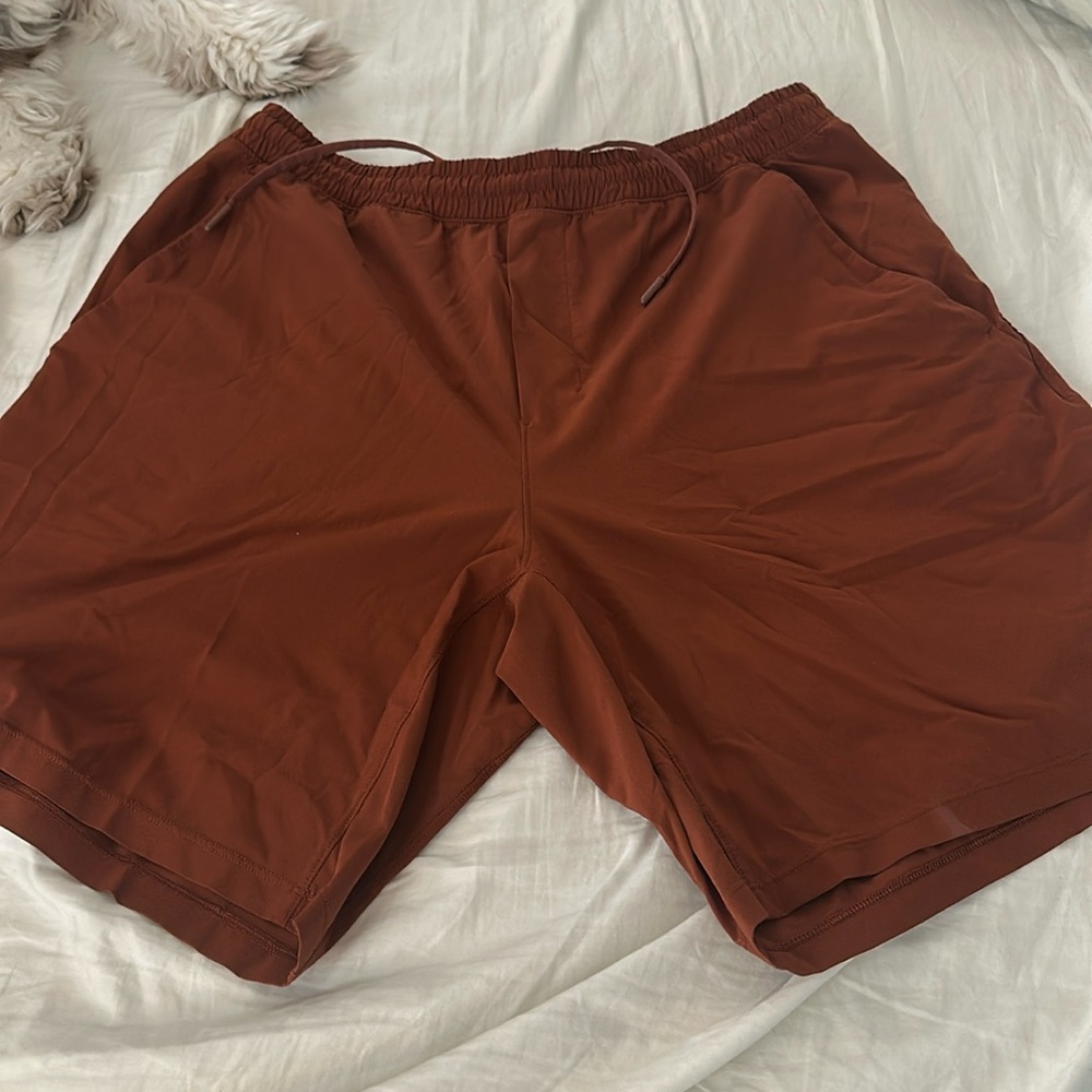 Lululemon 9” linerless shorts orange.  Size XL.